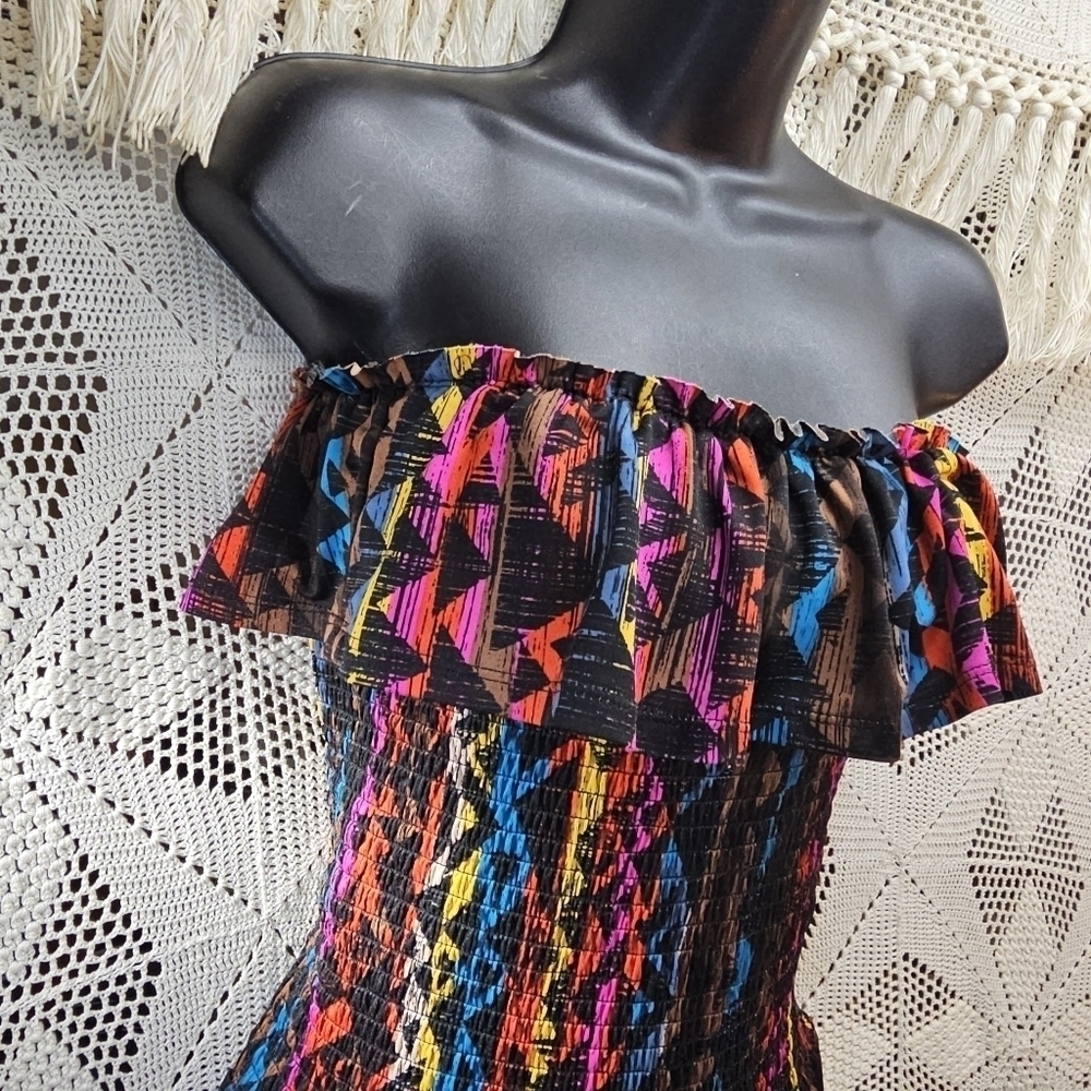 Planet Gold size small strapless jumper. Multi-color Aztec wide leg